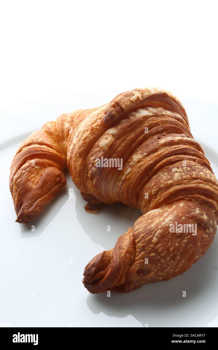 tipica colazione dolce francese conosciuta come croissant Foto Stock