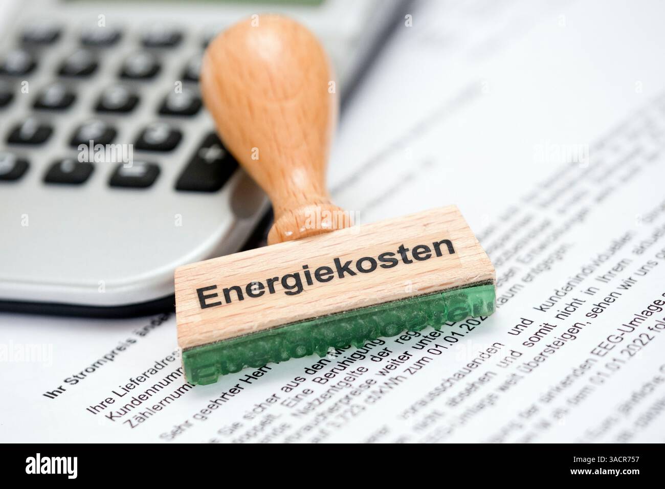 Timbrare con l'iscrizione costi energetici Foto Stock