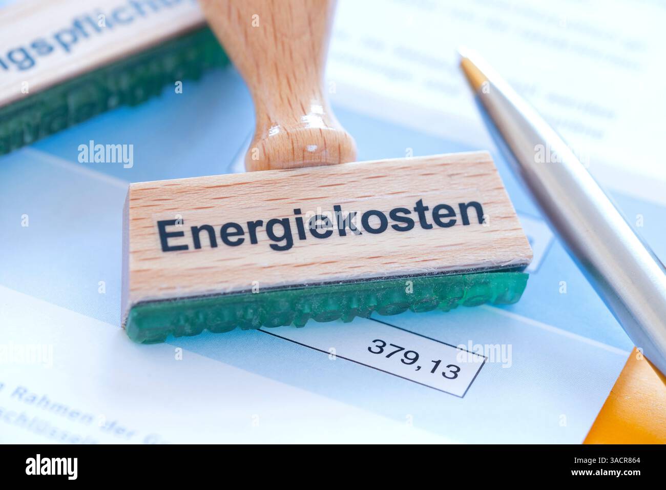 Timbrare con l'iscrizione costi energetici Foto Stock