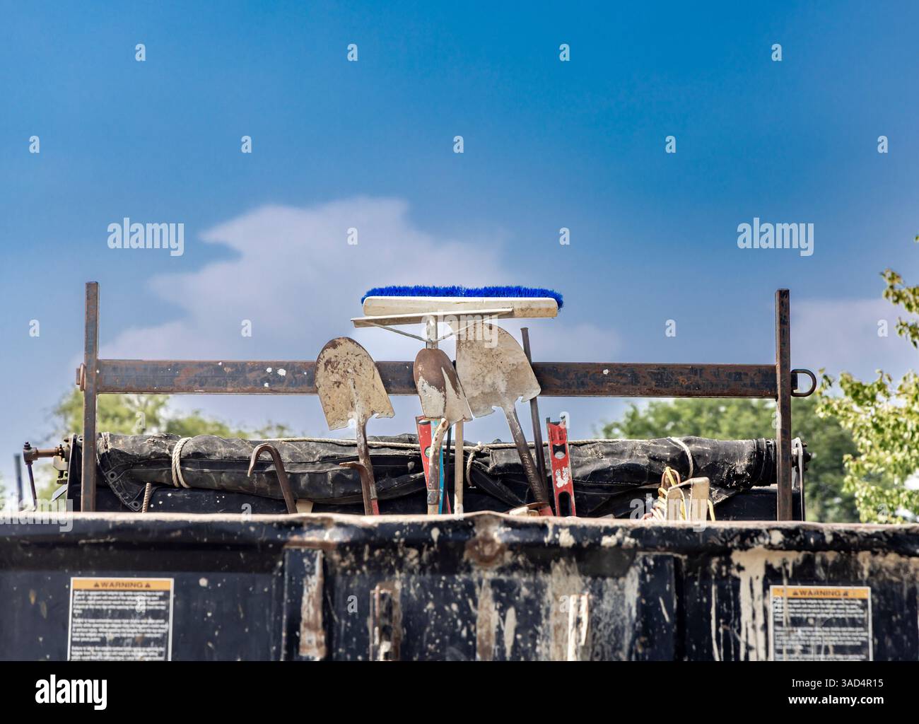 immagine di dettaglio di un veicolo da lavoro e degli attrezzi sul retro Foto Stock