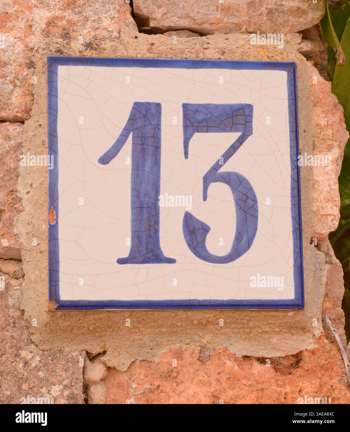 Casa il segno di numero Foto Stock