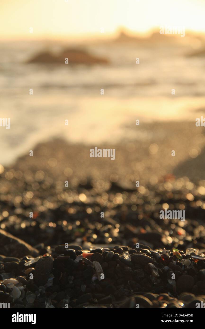 spiaggia di vetro al tramonto Foto Stock