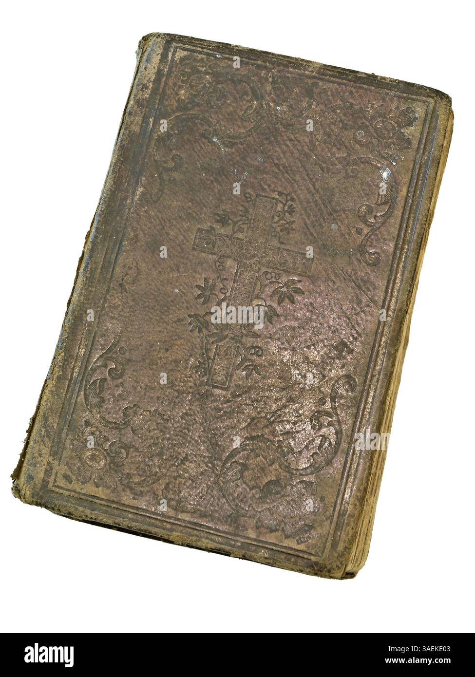 Vecchio libro chiuso al tavolo bianco Foto Stock