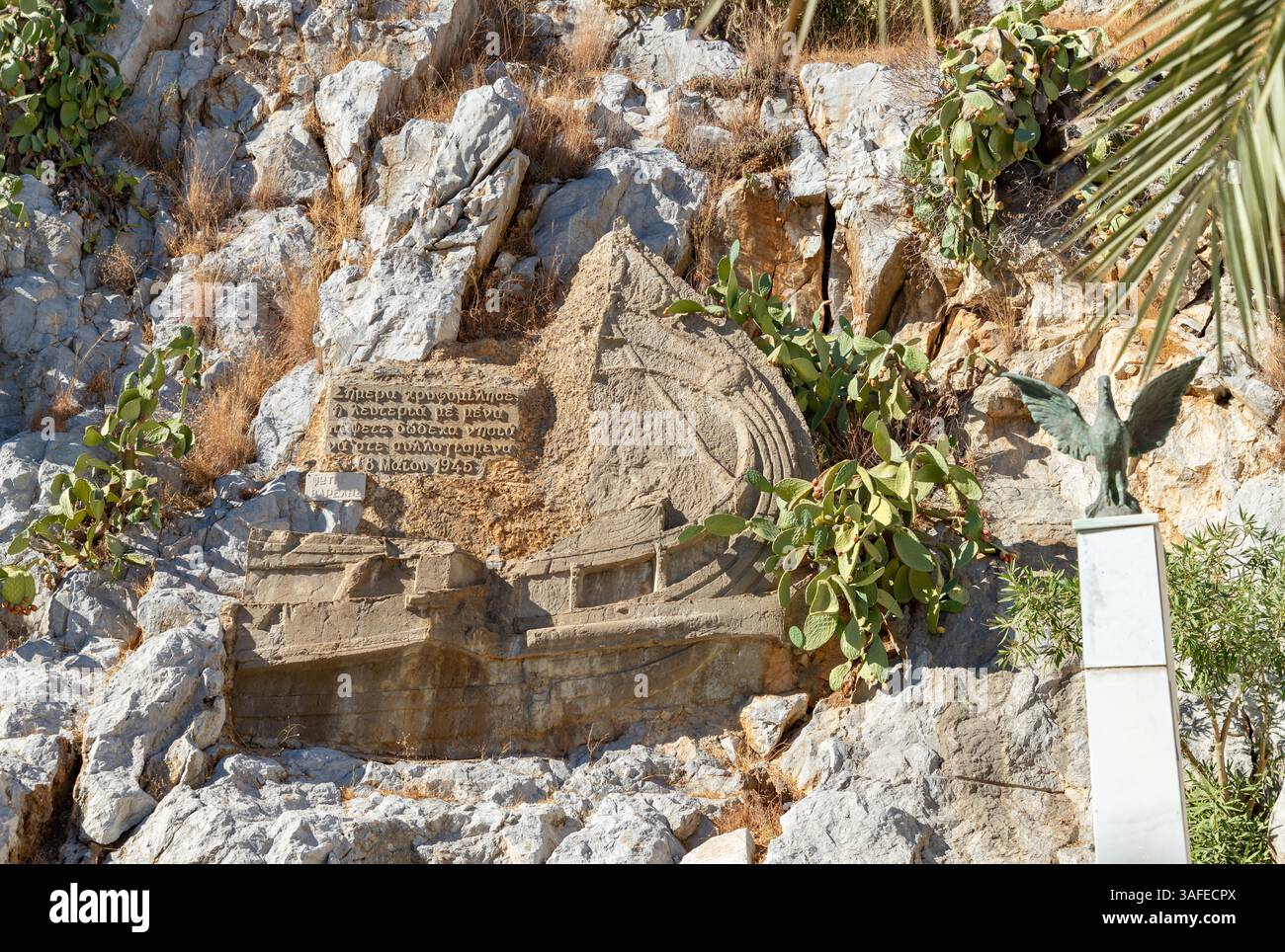 Una foto del Memoriale della seconda guerra mondiale nella città di Ano Symi nell'isola di Symi. Foto Stock