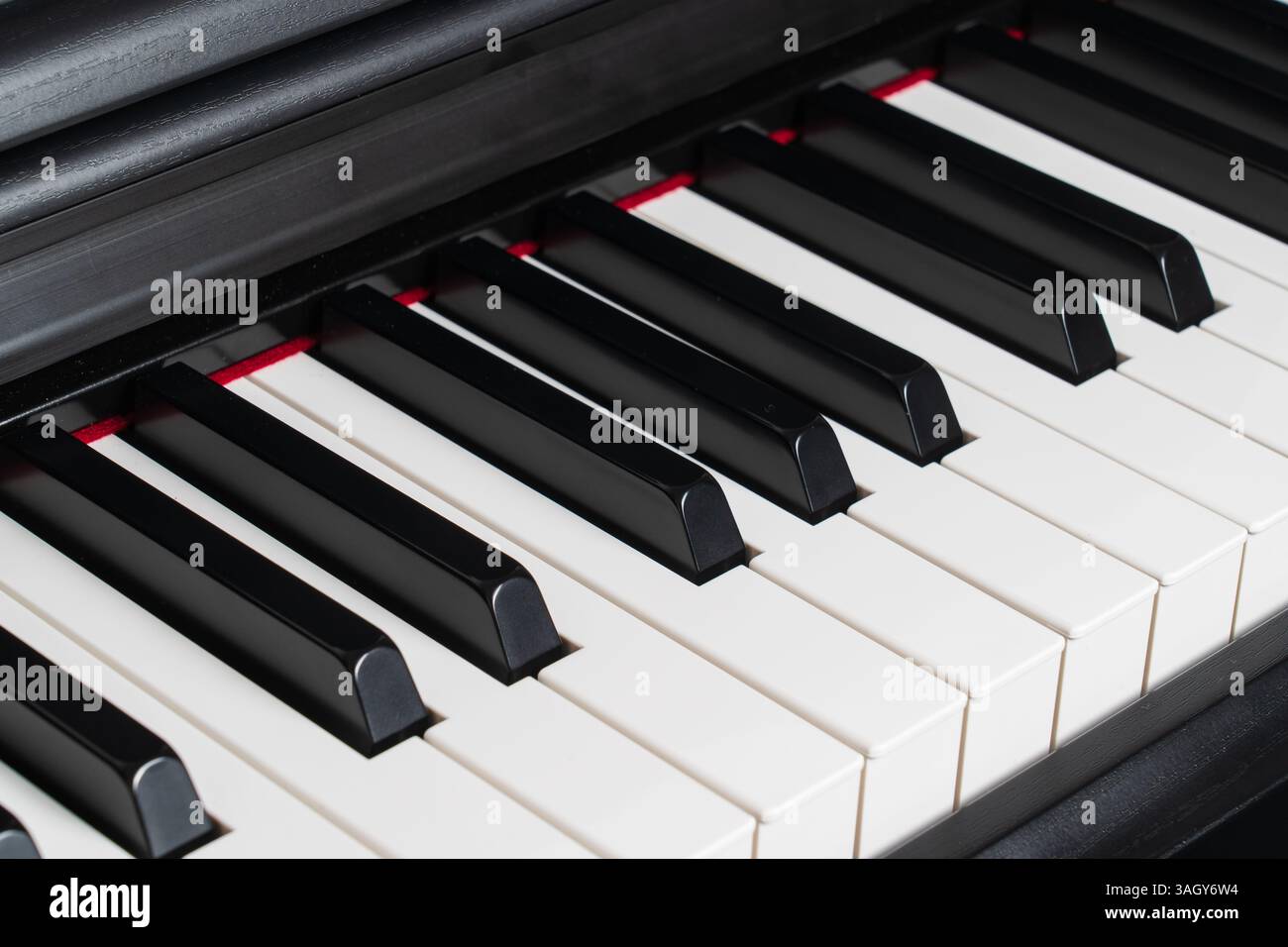 Primo piano dei tasti del piano, sfondo dello strumento musicale, sintetizzatore o tastiera per organo Foto Stock
