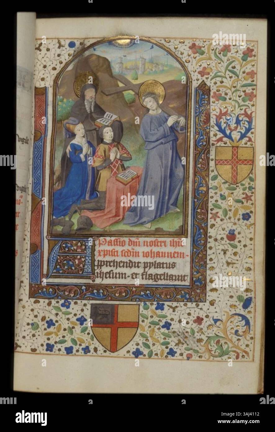 Questa illuminazione manoscritta del Libro delle ore, creata intorno al 1460-1470, mostra Cristo con i donatori del manoscritto. Il pezzo, parte della collezione British Library, presenta dettagliate e vibranti opere d'arte religiose. Foto Stock