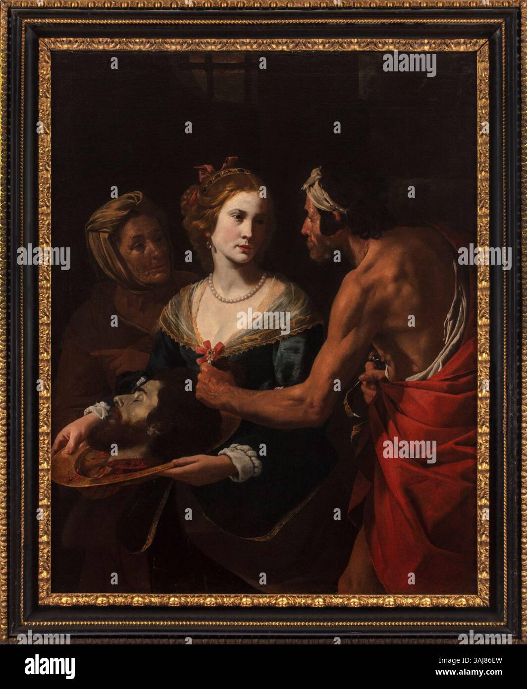 Questo dipinto ad olio su tela del XVII secolo di Hendrick de Somer ritrae la scena biblica di Salomè che riceve la testa di Giovanni Battista. La composizione drammatica cattura un momento dal nuovo Testamento. Foto Stock