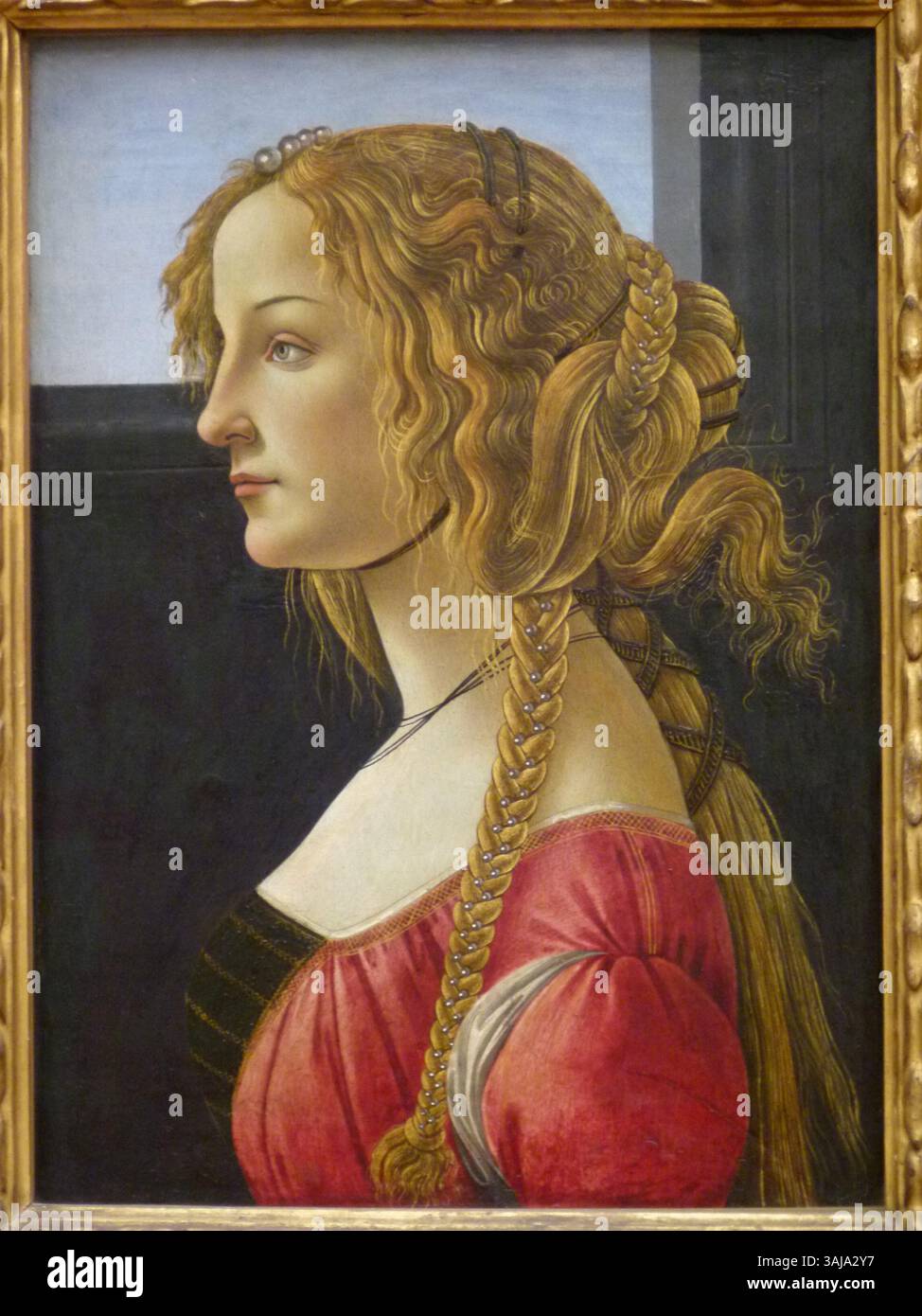 Un ritratto di profilo attribuito alla bottega di Sandro Botticelli, probabilmente raffigurante Simonetta Vespucci, dipinto tra il 1475 e il 1480. Foto Stock
