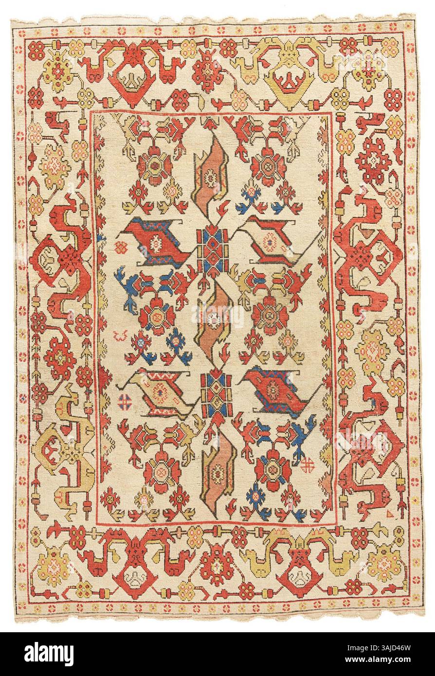 Questo tappeto Selendi della metà del XVII secolo, proveniente dalla regione di Oushak nell'Anatolia occidentale, presenta un caratteristico design "uccello". Conosciuta per la sua raffinata artigianato, rappresenta un esempio chiave dell'arte tessile ottomana durante il periodo. Foto Stock