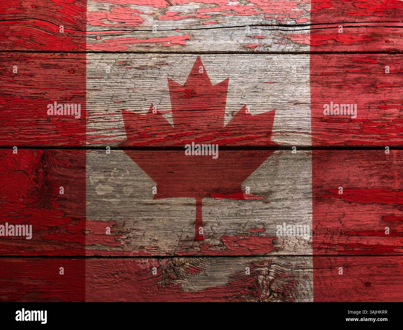 Bandiera canadese su vecchi pannelli rustici di legno con vernice rossa Foto Stock