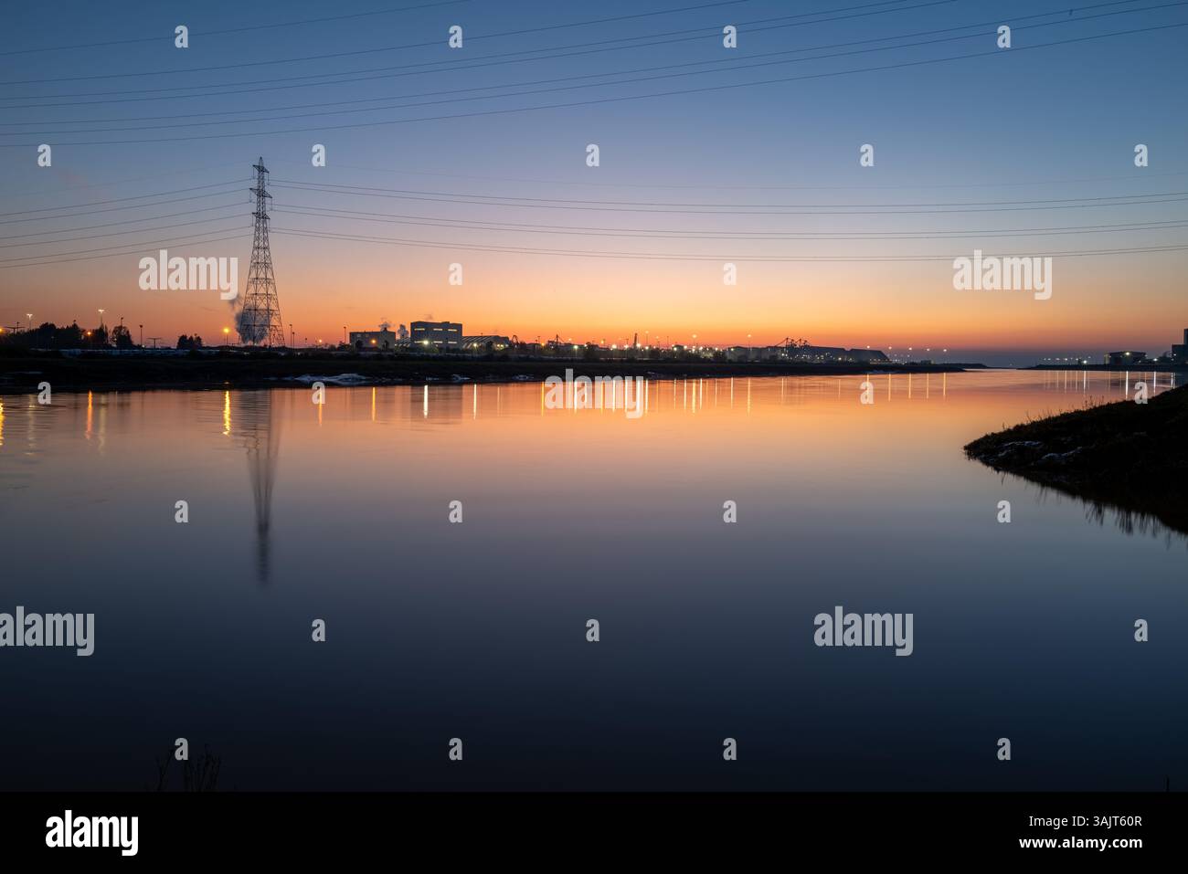 Tramonto sul fiume Avon guardando verso Portbury Docks, Bristol UK Foto Stock