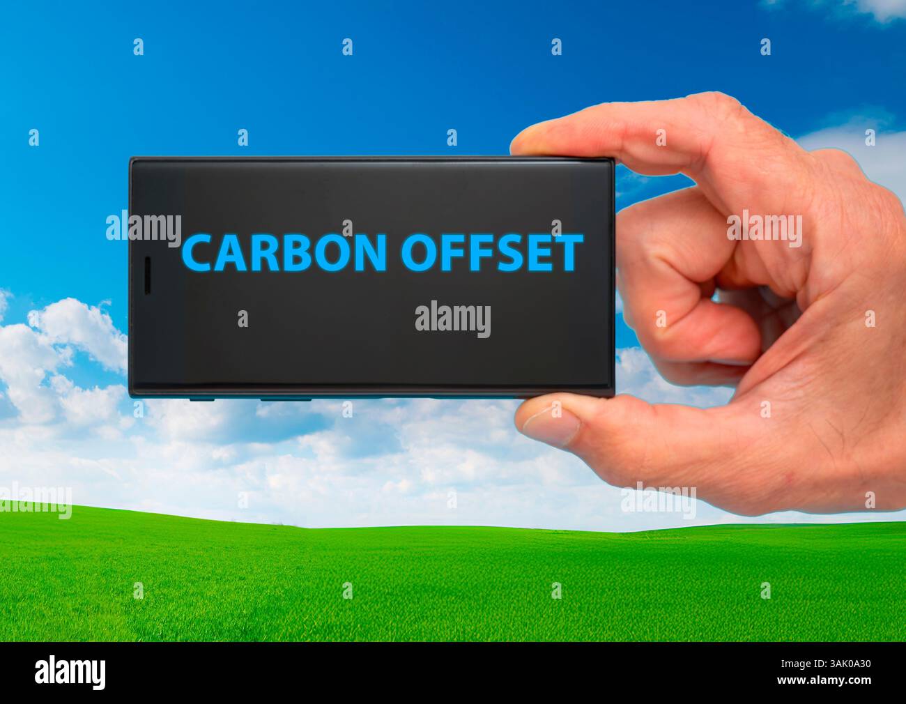 Offset carbonio. Compensare le emissioni di carbonio investendo in progetti che riducono le emissioni. Foto Stock Offset carbonio. Compensare le emissioni di carbonio investendo in progetti che riducono le emissioni. Foto Stock