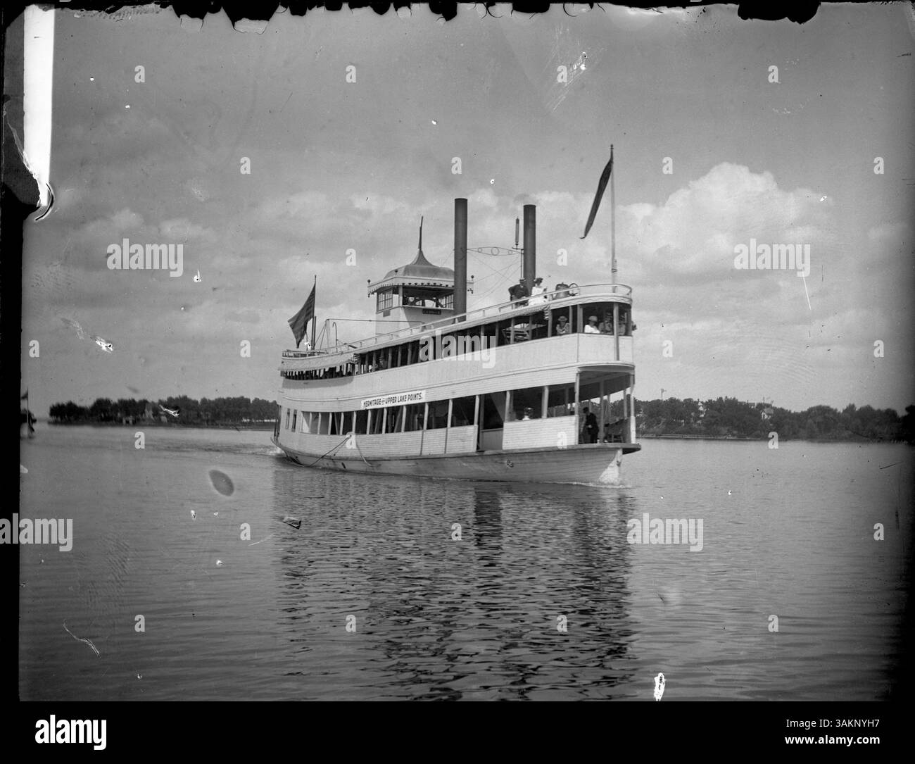 Il piroscafo "Excelsior", precedentemente chiamato "George", era una barca notevole sul lago Minnetonka, con un cartello con la scritta "Hermitage and Upper Lake Points". Fa parte del trasporto marittimo storico del lago. Foto Stock