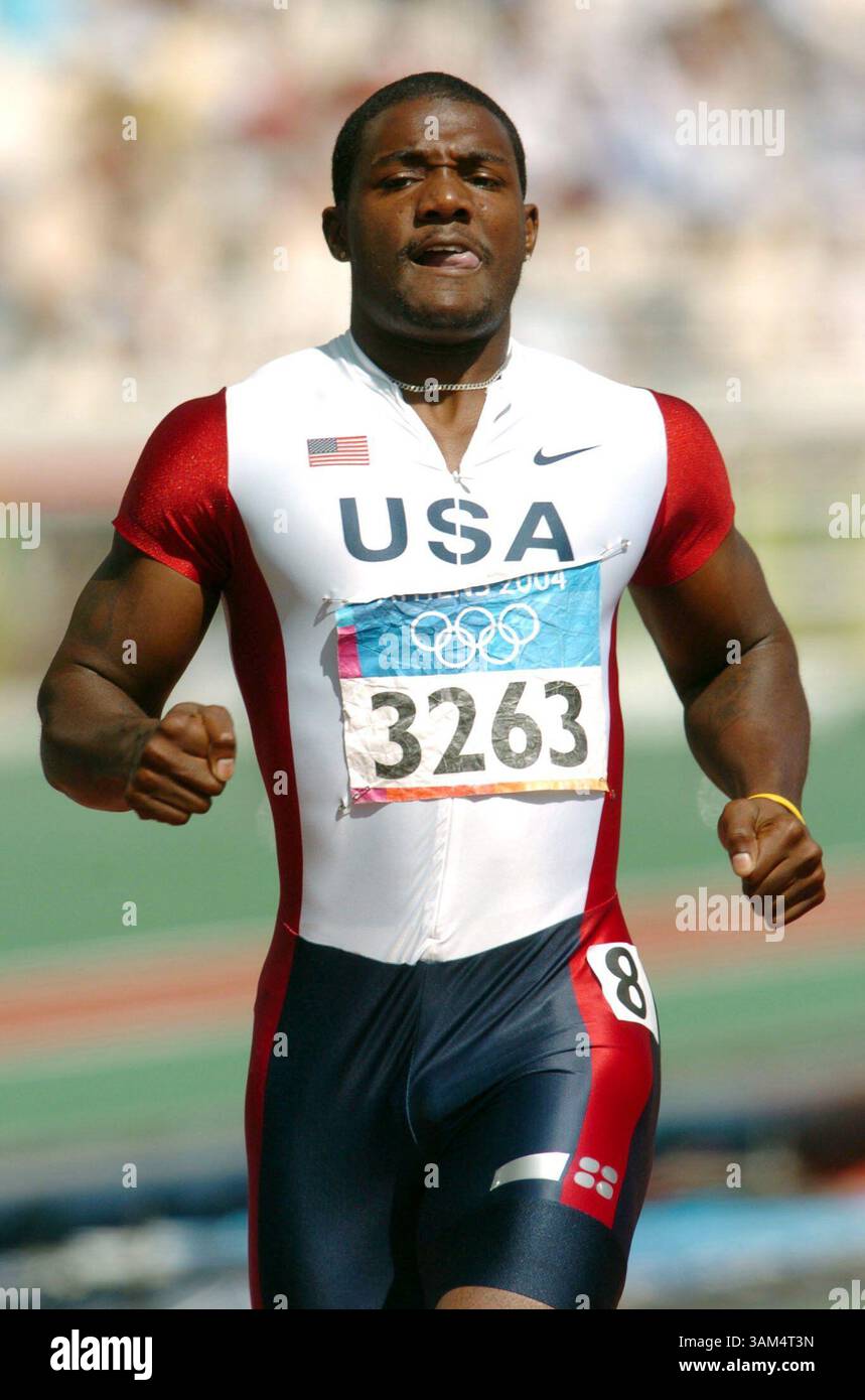 24 agosto 2004 - Stati Uniti - KRT SPORTS STORY SLUGGED: OLY-TRACK KRT FOTO DI KARL MONDON/CONTRA COSTA TIMES (24 agosto) ATENE, GRECIA - Justin Gatlin corre un tempo di qualificazione di 20,51 nei 200 m di caldo allo Stadio Olimpico martedì 24 agosto 2004. Gatlin è la medaglia d'oro dei 100 metri. . (ag) 2004 (immagine di credito: © Contra Costa Times/mct/ZUMAPRESS.com) Foto Stock