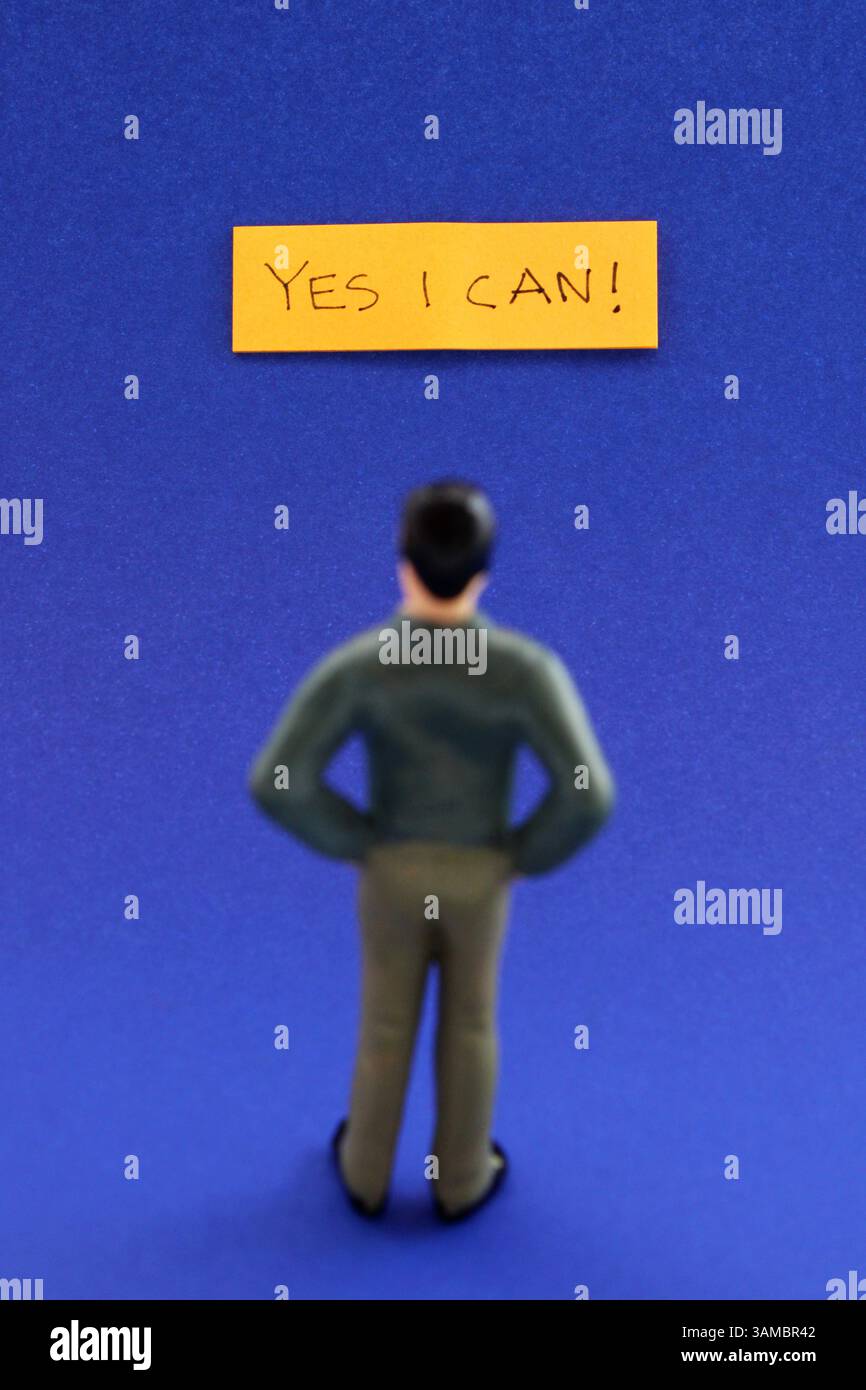 Dirigente d'azienda davanti alla frase, sì, posso - formato verticale Foto Stock