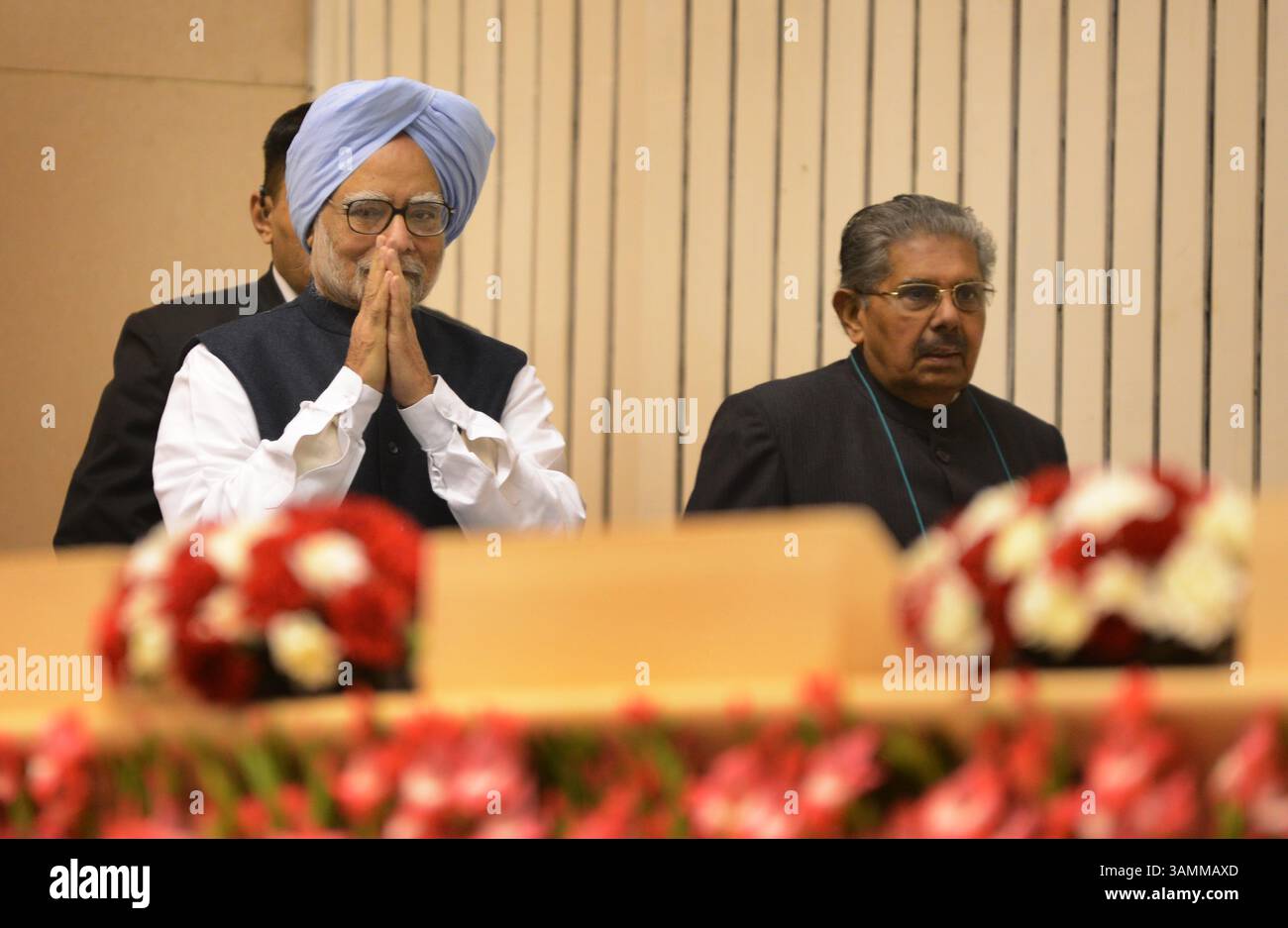 8 gennaio 2014 - il primo ministro indiano Manmohan Singh con il ministro dell'Unione per gli affari indiani d'oltremare, Vayalar Ravi, il 2° giorno della dodicesima conferenza indiana d'oltremare "Pravasi Bharatiya Divas 2014" a nuova Delhi, India, l'8 gennaio 2014. Credito fotografico: Indian Photo Agency (immagine di credito: © INPA/ZUMAPRESS.com) Foto Stock
