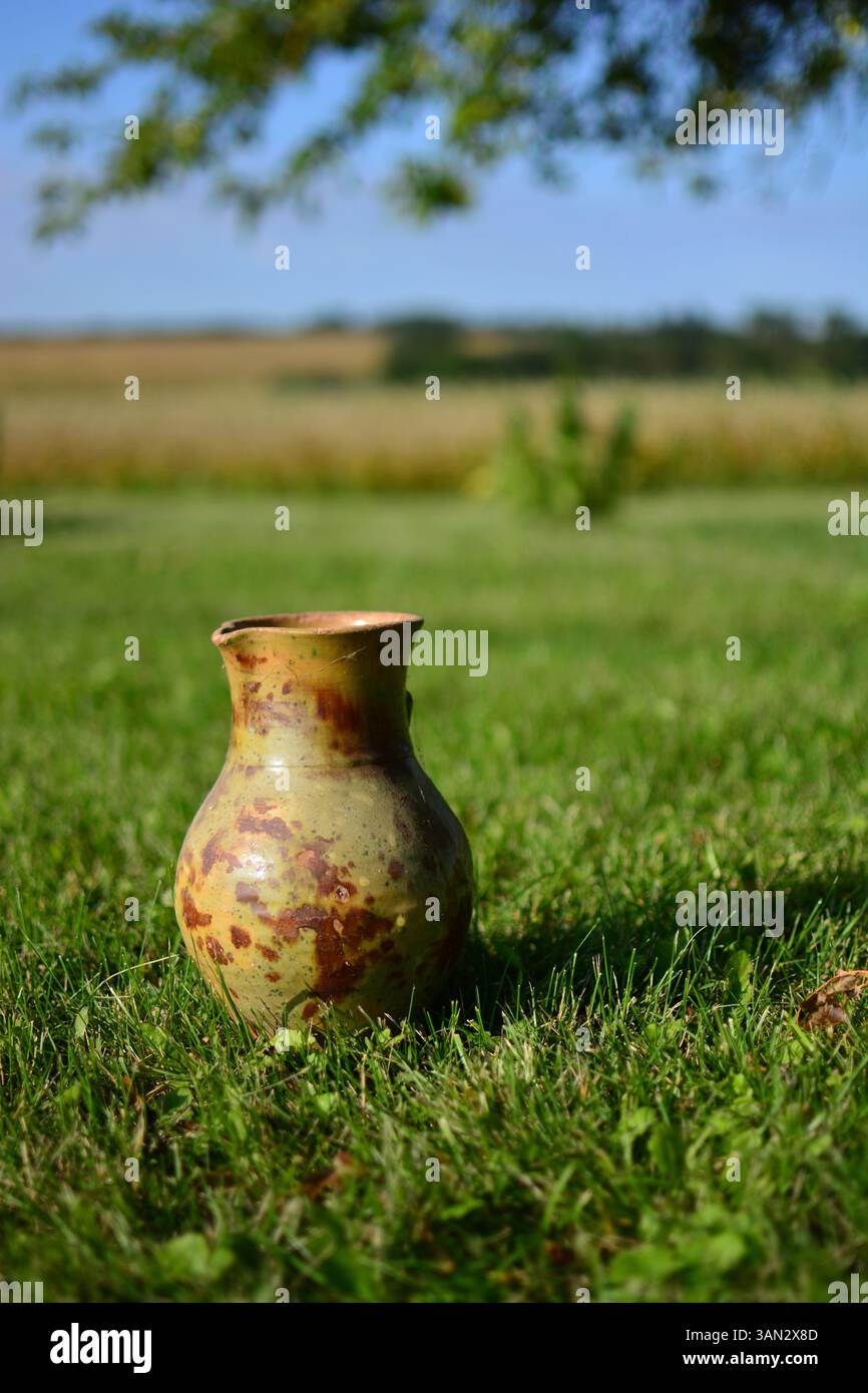 Vintage contenitore del latte in Shabby Chic Rusty decorazioni per matrimoni Foto stock