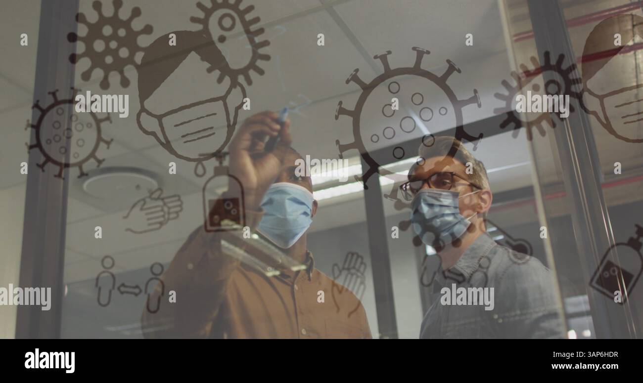 Immagine di cellule e icone del covid 19 che fluttuano sopra due uomini in maschere facciali in ufficio Foto Stock
