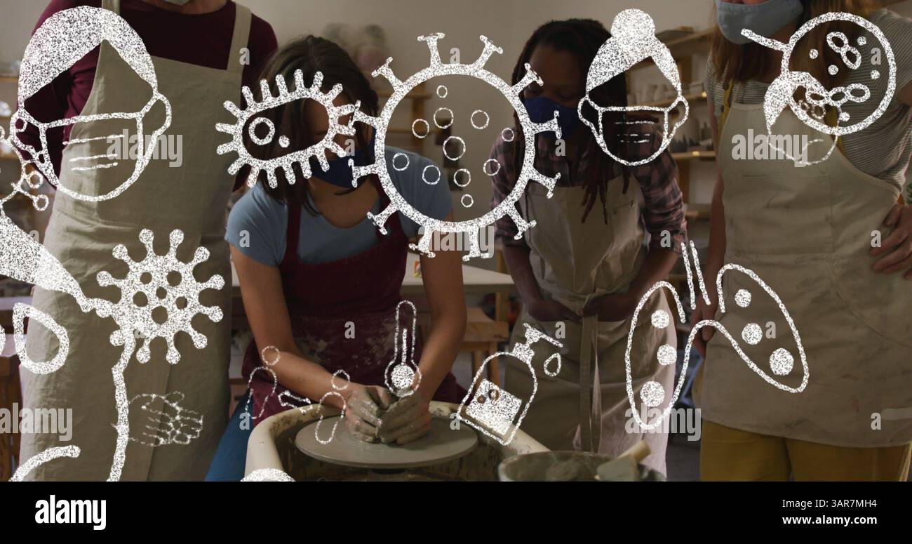 Immagine di icone covid 19 sulle donne che lavorano in studio di ceramica indossando maschere facciali Foto Stock