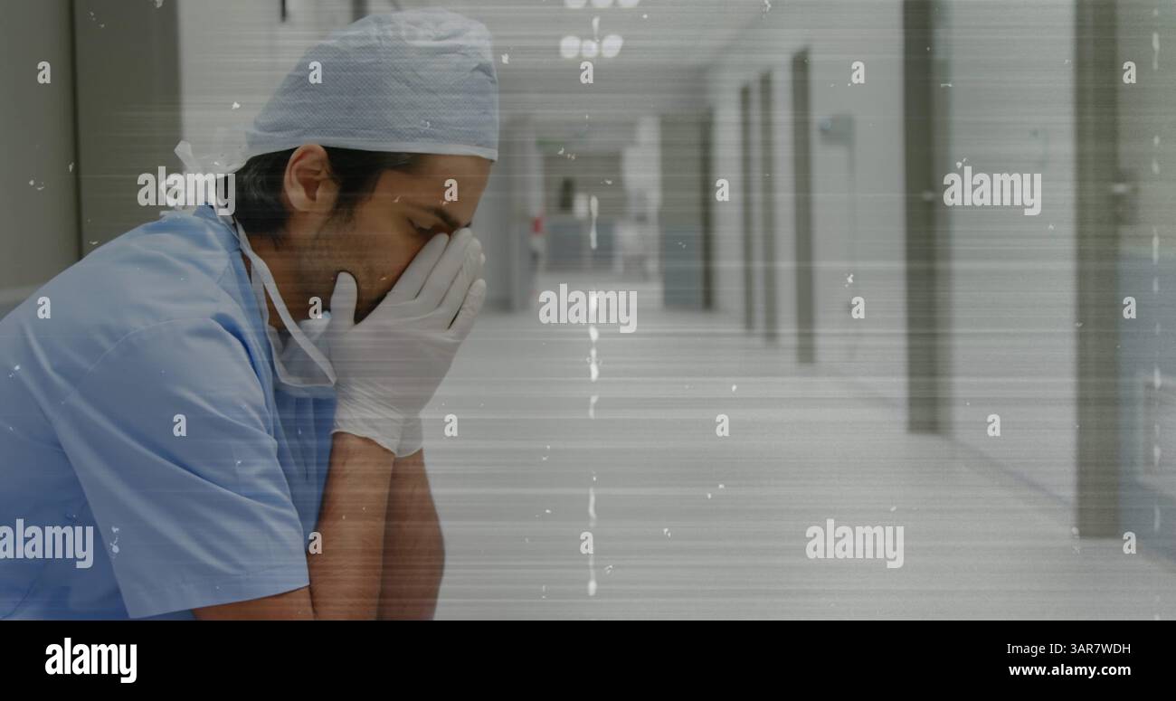Immagine composita di effetto statico tv contro il lavoratore maschile stressato in ospedale Foto Stock