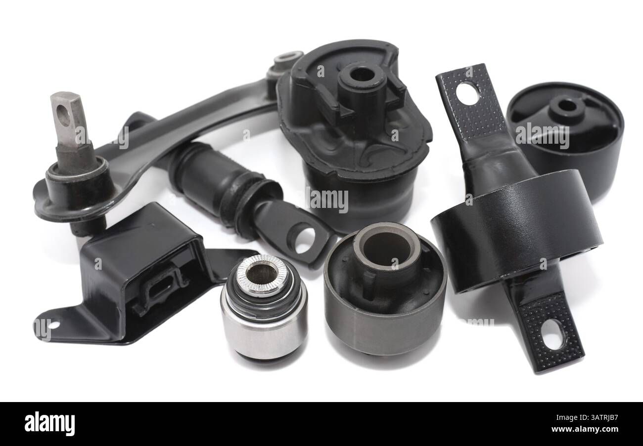 Alcuni ricambi auto su sfondo bianco Foto Stock
