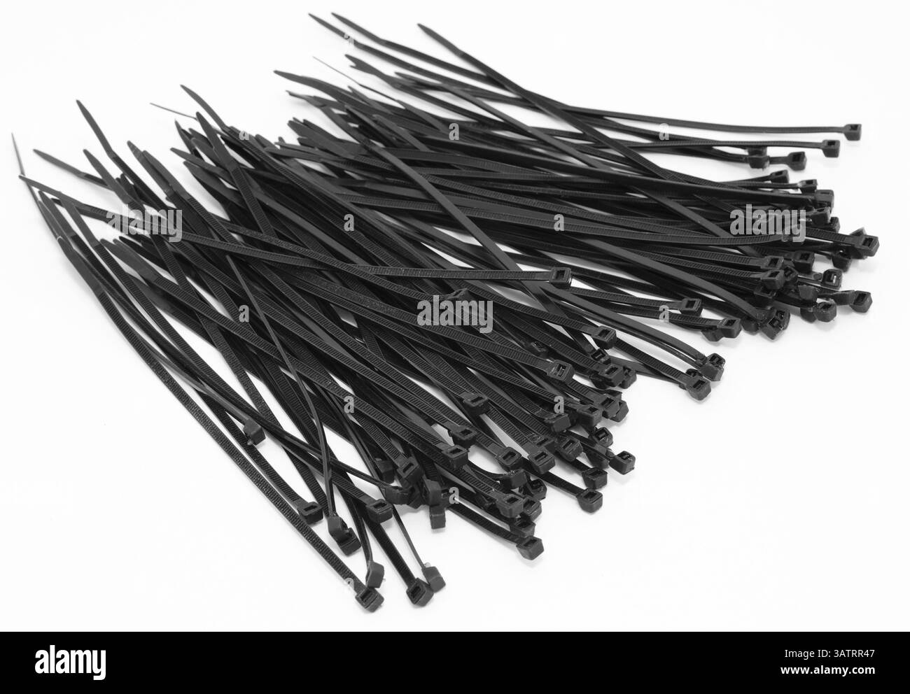 Molte nuove fascette per cavi in nylon nero Foto Stock