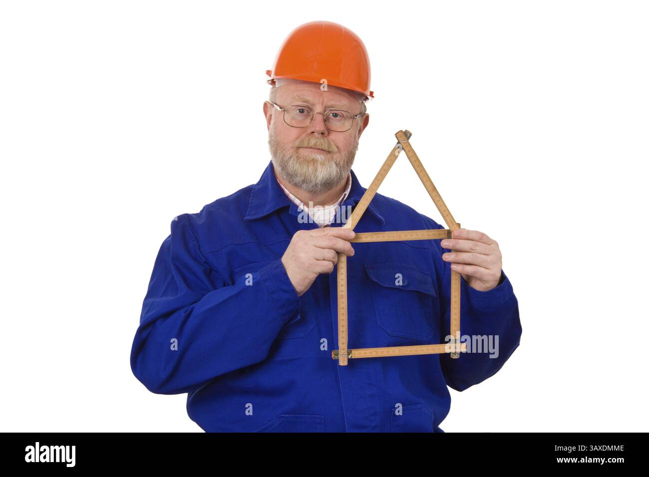 Artigiano con righello pieghevole ripiegato in una casa - opzionale Foto Stock