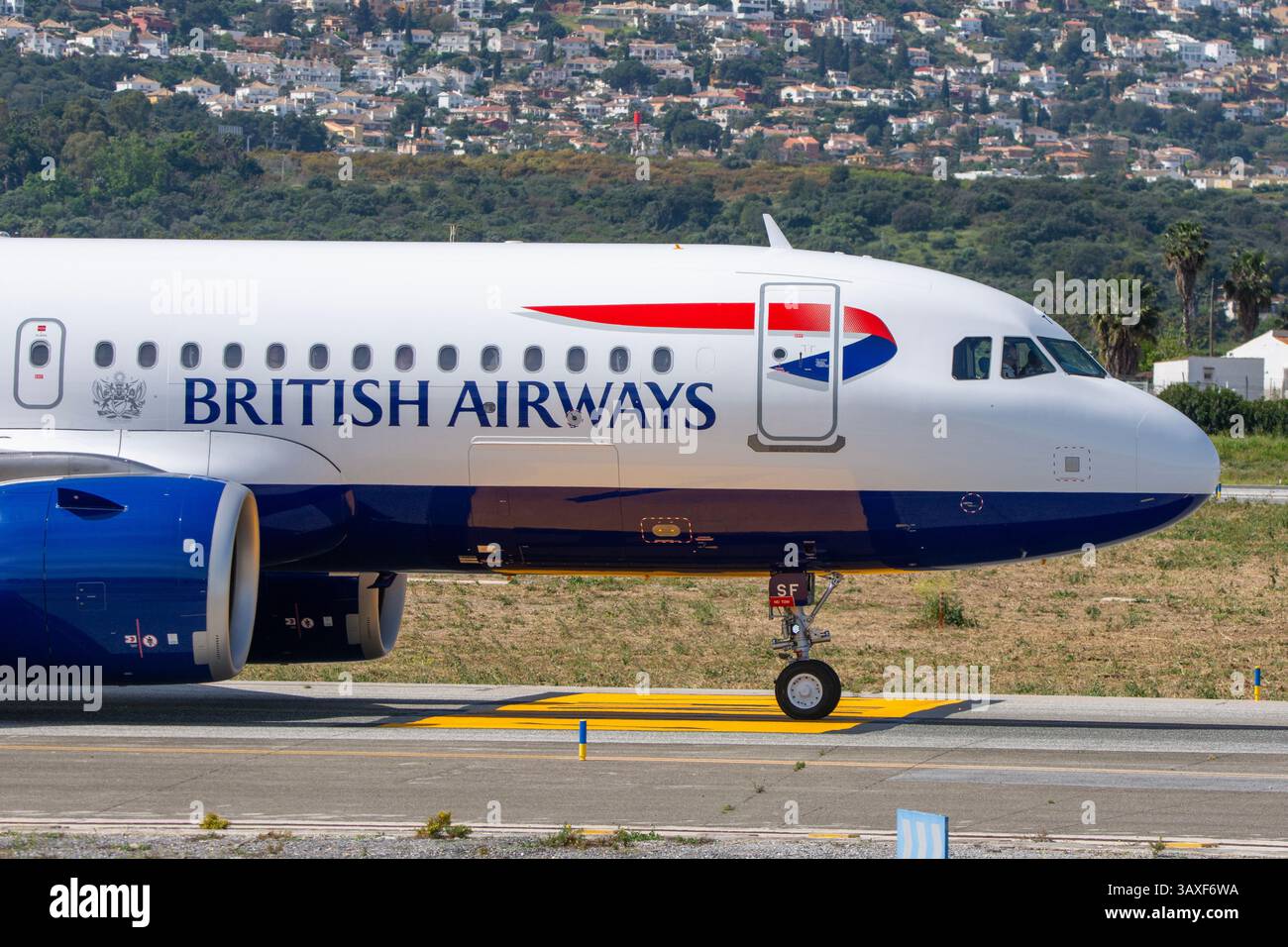 British Airways Airbus A320 in manovra per il decollo all'aeroporto di Málaga Costa del Sol. Foto Stock