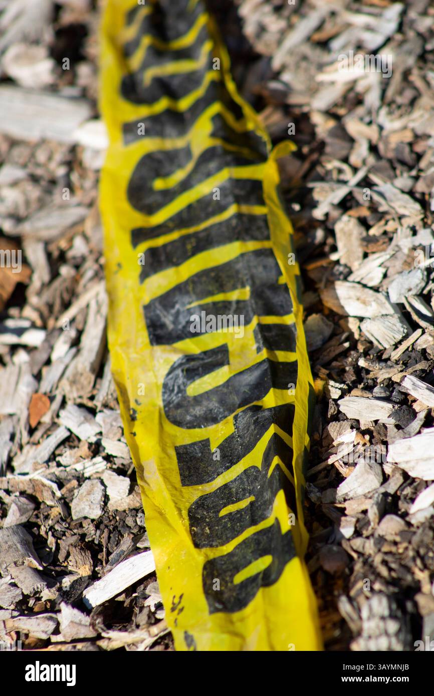 nastro di avvertenza giallo con scritta in spagnolo Foto Stock