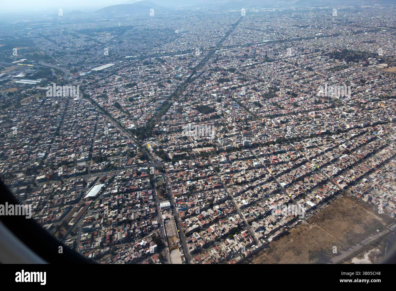 Vista aerea di città del Messico dalla finestra dell'aereo Foto Stock