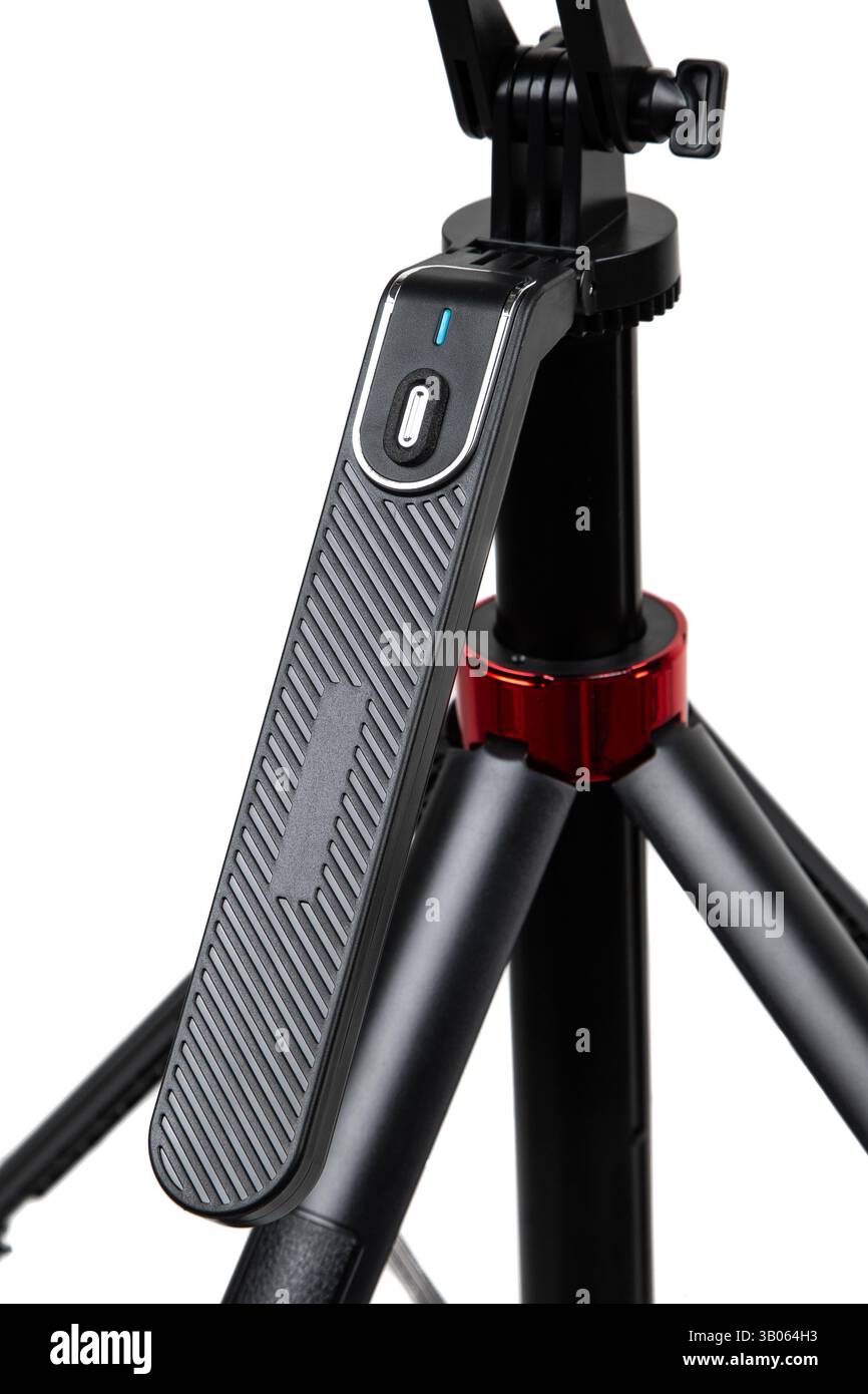Treppiede regolabile con supporto per smartphone e telecomando Bluetooth Foto Stock