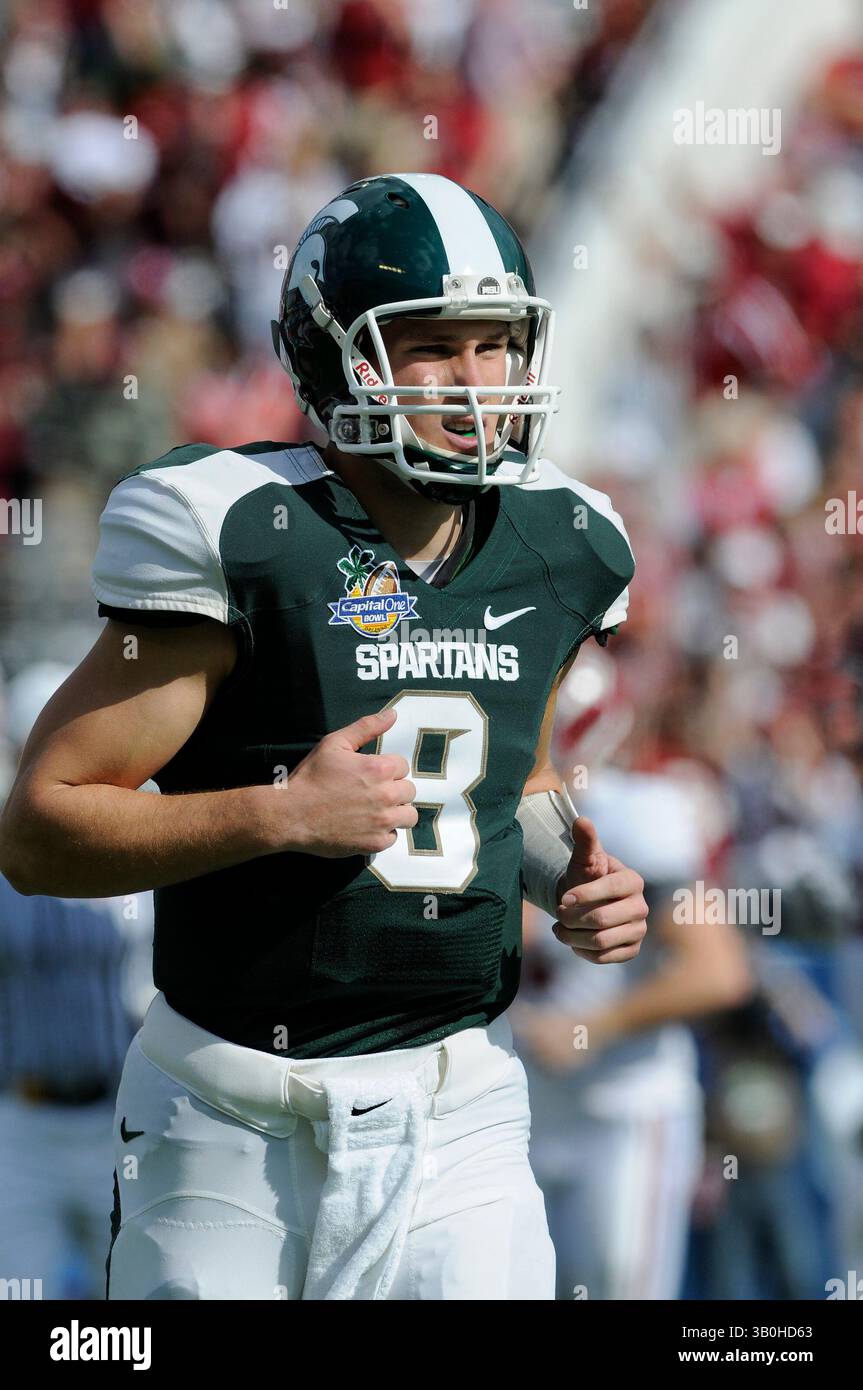 1 gennaio 2011: Kirk Cousins dei Michigan State Spartans in azione durante la partita di football NCAA tra MSU e Alabama Crimson Tide al Capital One Bowl 2011 a Orlando, Florida. Alabama ha battuto il Michigan State 49-7. (Immagine di credito: © JC Ridley/Cal Sport Media/ZUMAPRESS.com) Foto Stock