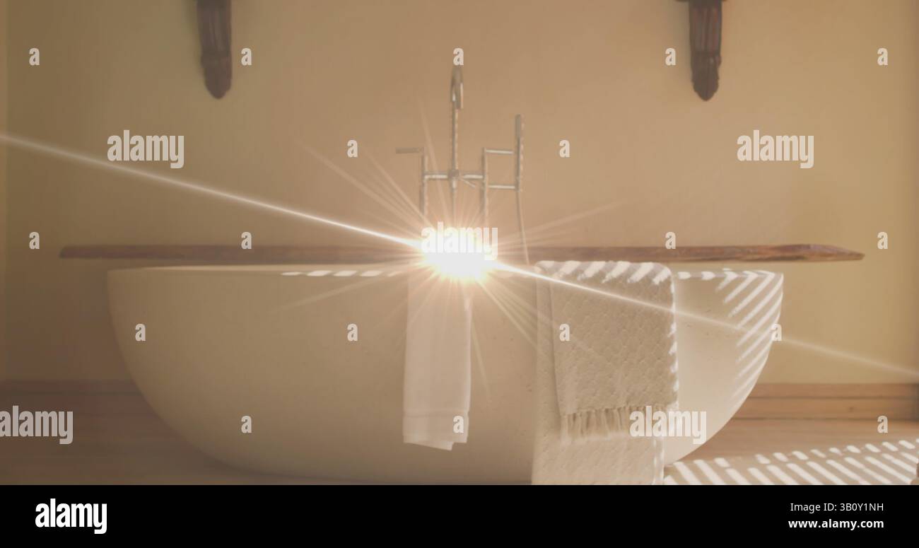 Immagine di macchie di luce sul bagno e sugli asciugamani Foto Stock