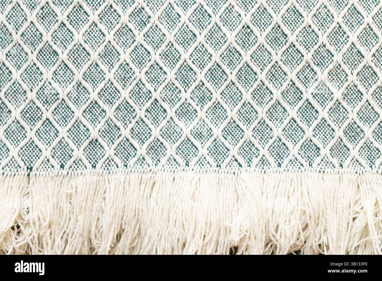 Primo piano con motivo a coperta con frange, tessuto morbido, coperta Foto Stock