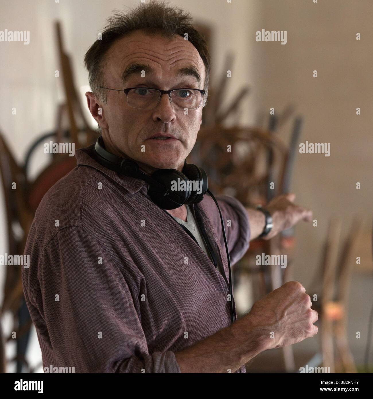 DATA DI USCITA: 23 ottobre 2015.TITOLO: Steve Jobs. STUDIO: Universal Pictures. DIRETTORE: Danny Boyle. TRAMA: Steve Jobs ci porta dietro le quinte della rivoluzione digitale, per dipingere un ritratto dell'uomo al suo epicentro. La storia si svolge dietro le quinte di tre iconici lanci di prodotti, terminando nel 1998 con la presentazione dell'iMac..NELLA FOTO: Danny Boyle. (Crediti: © Universal Pictures/Entertainment Pictures) Foto Stock