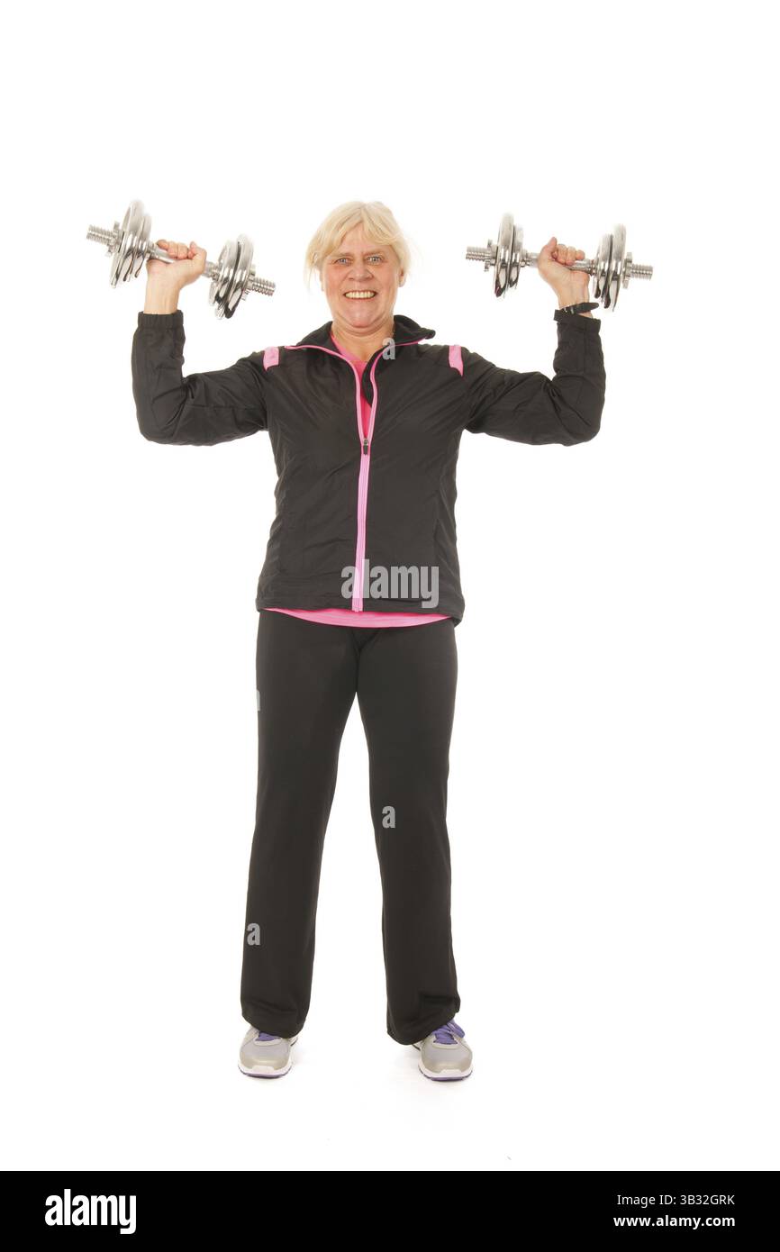 Senior donna manubri di sollevamento Foto Stock