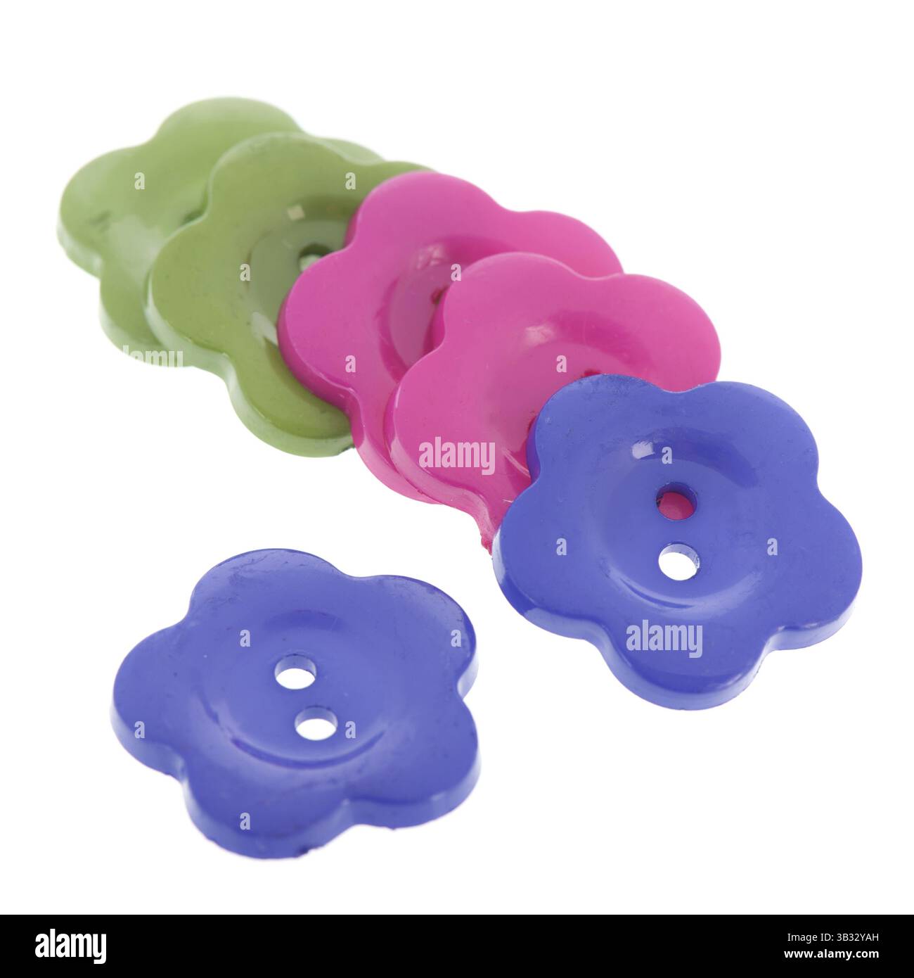 Diversi pulsanti colorati a forma di fiore isolate su sfondo bianco Foto Stock