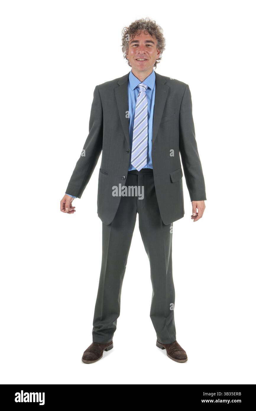 Bel uomo adulto con capelli ricci e abito formale Foto Stock