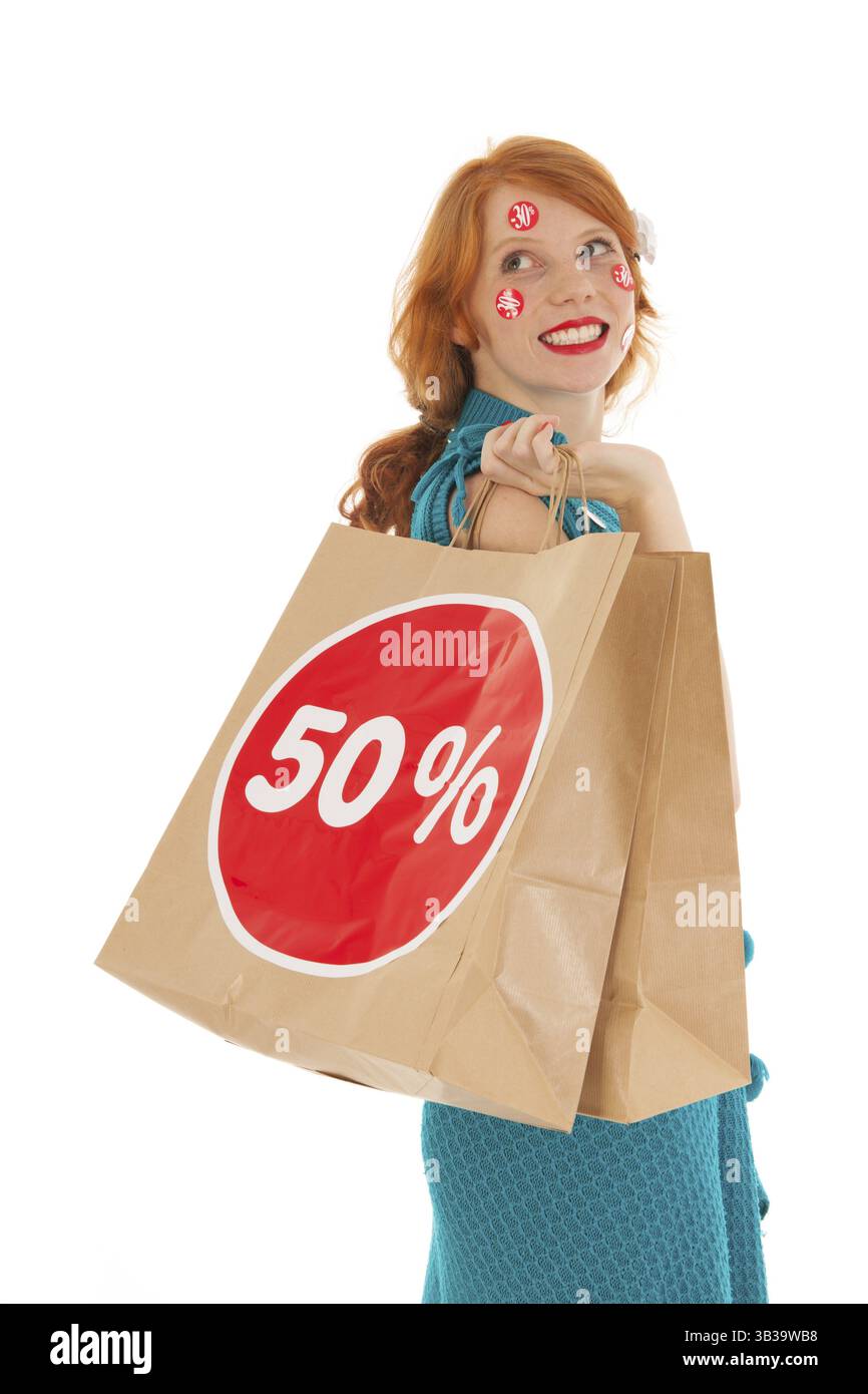 Donna con shopping bag e riduzione Foto Stock