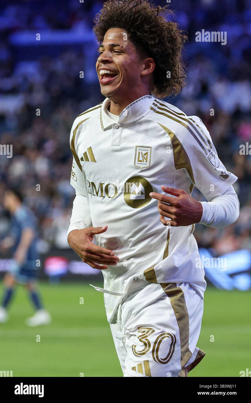 Kansas City, Kansas, Stati Uniti. 22 marzo 2025. L'attaccante del Los Angeles FC David Martinez (30) reagisce al suo gol contro lo Sporting Kansas City durante il primo tempo di una partita di calcio della MLS al Childrens Mercy Park di Kansas City, Kansas. David Smith/CSM/Alamy Live News Foto Stock