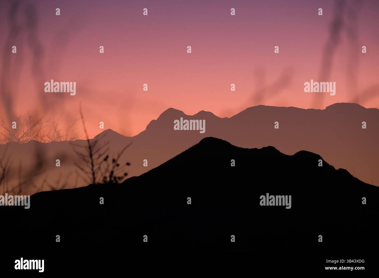 Doppia esposizione di un tramonto nel deserto di Sonora, Arizona meridionale, Stati Uniti Foto Stock