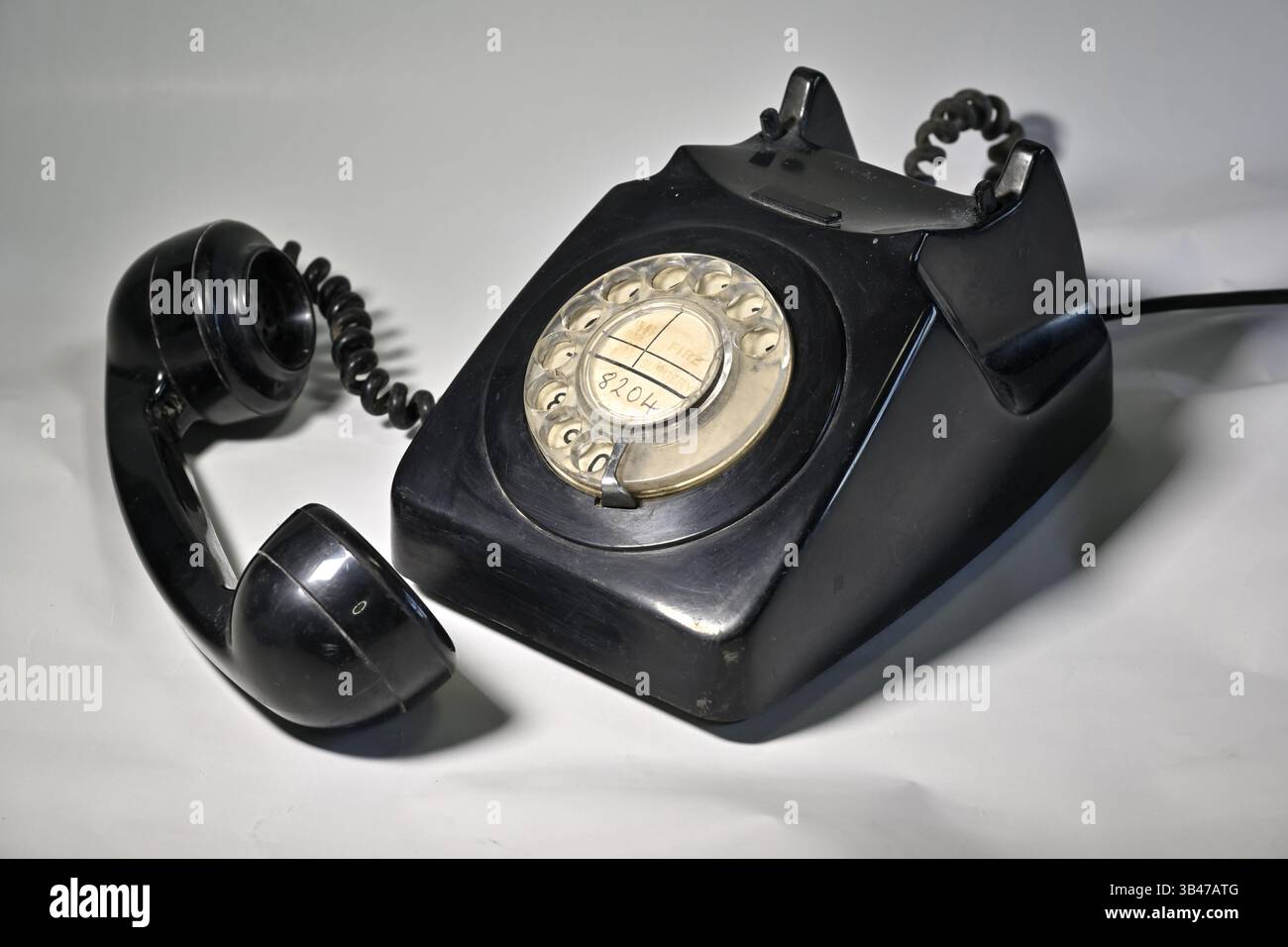 Telefono con manopola rotante e ricevitore Foto Stock