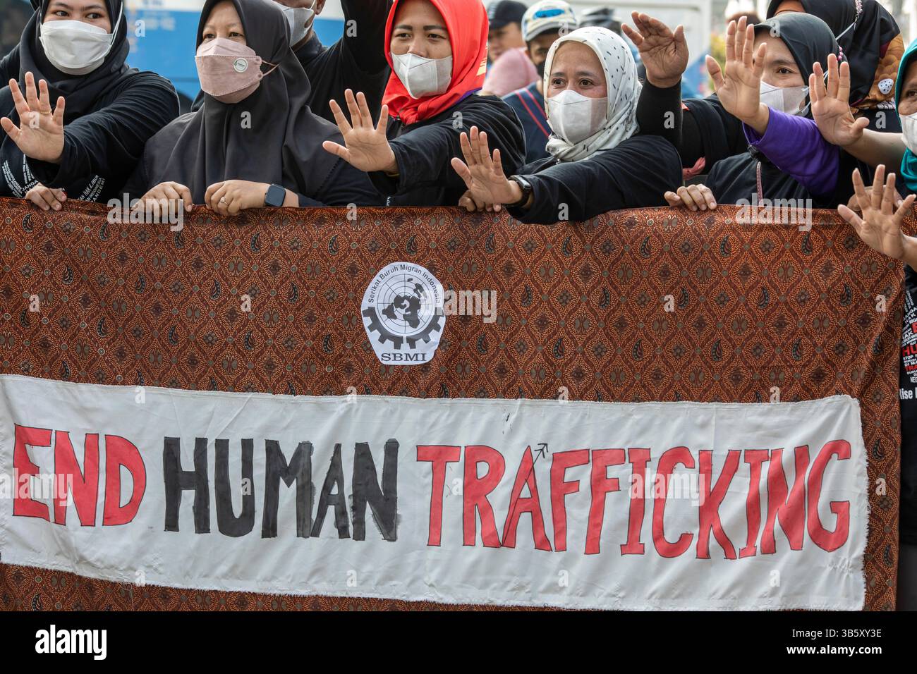 31 luglio 2022, Giacarta, Giacarta, Indonesia: Giacarta, Indonesia, 31 luglio 2022: in commemorazione della giornata mondiale contro il traffico, l'Unione indonesiana dei lavoratori migranti ha svolto un'attività di risposta effettiva tenendo un flashmob alla rotonda dell'Hotel Indonesia, Jakarta. (Immagine di credito: © Donal Husni/ZUMA Press Wire) Foto Stock