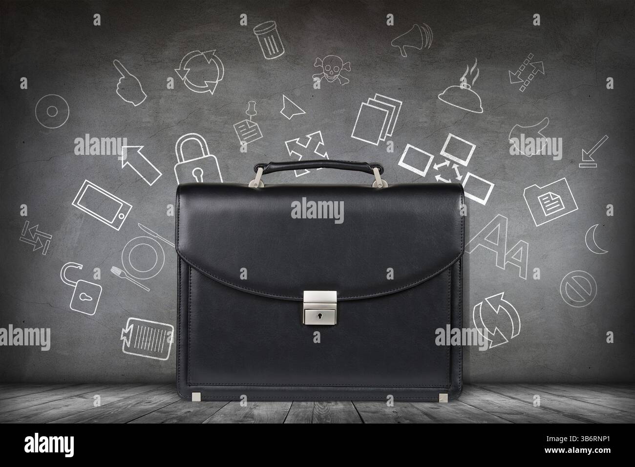 Nera borsa in pelle su business icone sul muro grigio sfondo Foto Stock