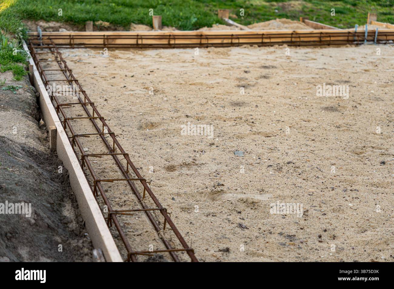Primo piano della costruzione per rinforzare le fondamenta pronte per il versamento del calcestruzzo Foto Stock