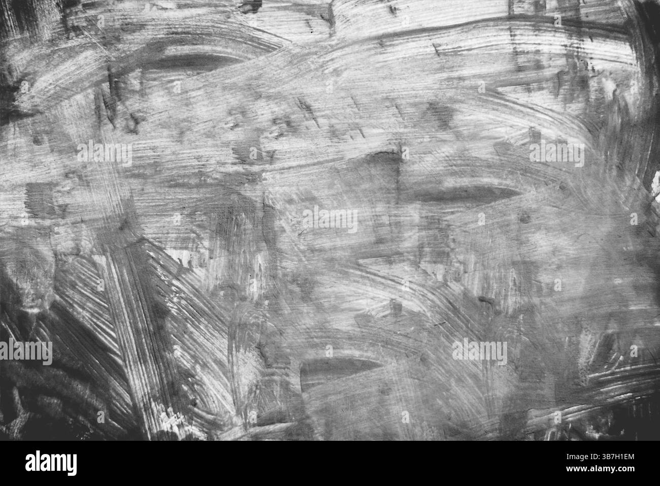 Pennellate grigie per creare uno sfondo dinamico con texture e aree chiare e scure.Bielorussia Foto Stock
