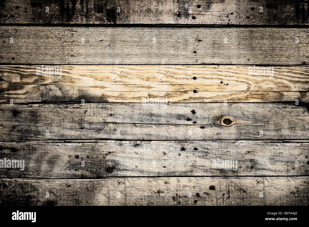 Tavole di legno orizzontali che formano uno sfondo testurizzato, intemperie e che mostrano nodi e granella.Bielorussia Foto Stock