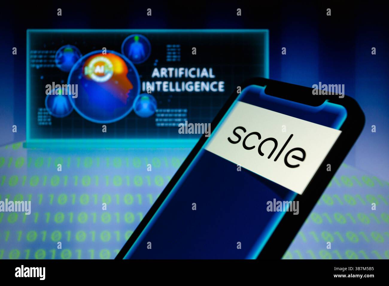 21 maggio 2024, Asuncion, Paraguay: Il logo scale ai viene visualizzato su uno smartphone retroilluminato da una rappresentazione visiva dell'intelligenza artificiale e cifre del codice binario. Scale ai, una startup che fornisce dati al modello ai, ha annunciato di aver chiuso una transazione di finanziamento da 1 miliardo di dollari con una valutazione di 13,8 miliardi di dollari. "Il finanziamento, un mix di primario e secondario, è guidato dall'investitore esistente Accel con la partecipazione di quasi tutti gli investitori esistenti: Y Combinator, Nat Friedman, Index Ventures, Founders Fund, Coatue, Thrive Capital, Spark Capital, NVIDIA, Tiger Global Management, Greenoaks, e WEL Foto Stock