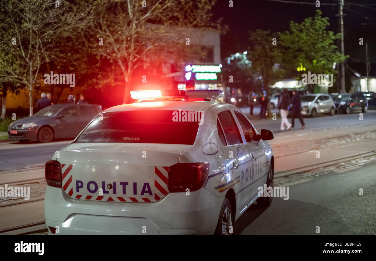 Auto della polizia di notte Foto Stock
