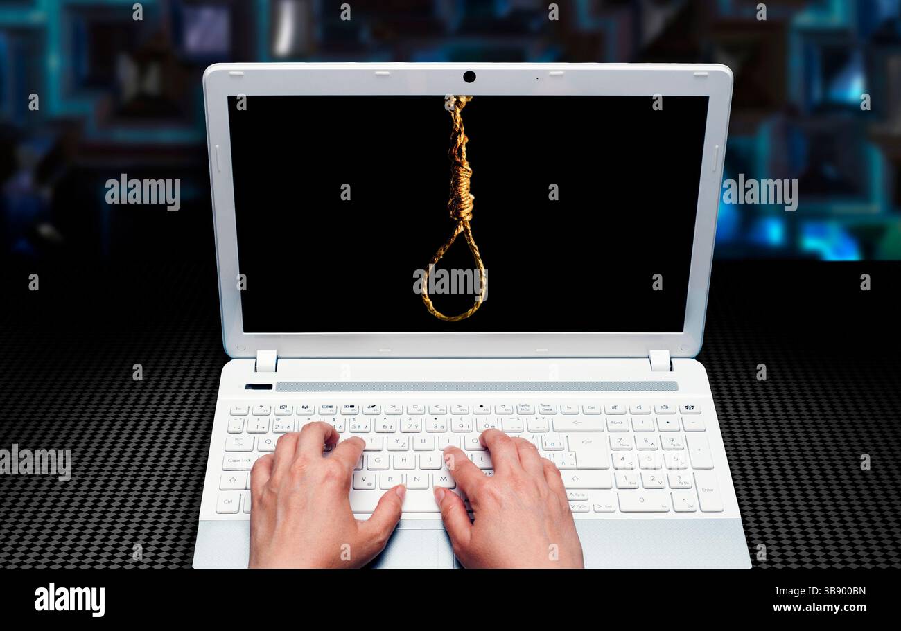 corda appesa allo schermo di un laptop Foto Stock